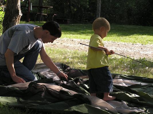 David and Noah put up the tent.