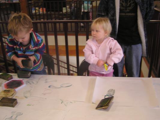 Noah and Sarah make bird stamp pictures