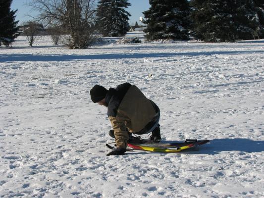 David sledding.
