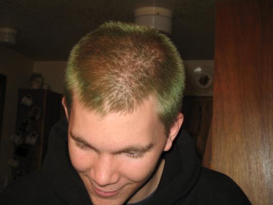 Someone has green hair.