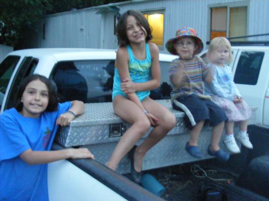 Malia, Andrea, Noah and Sarah in Jim's truck