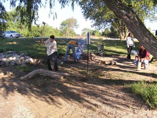 Christian Student Fellowship campout.
Chopping firewood.