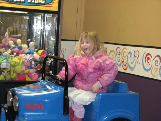 Sarah playing at the mall.