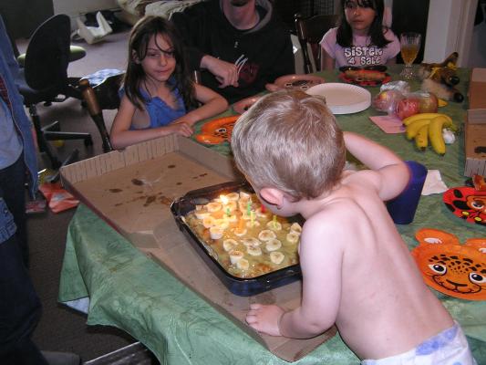 Noah re-blows out the candles.