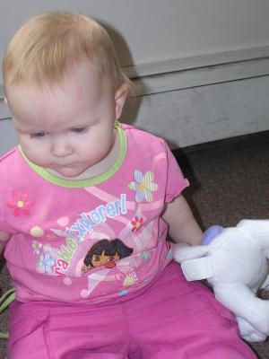 Sarah plays with her new kitty.