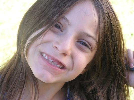 Andrea's toothless smile.