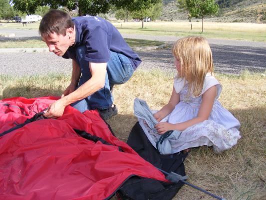 David and Sarah set up a tent.