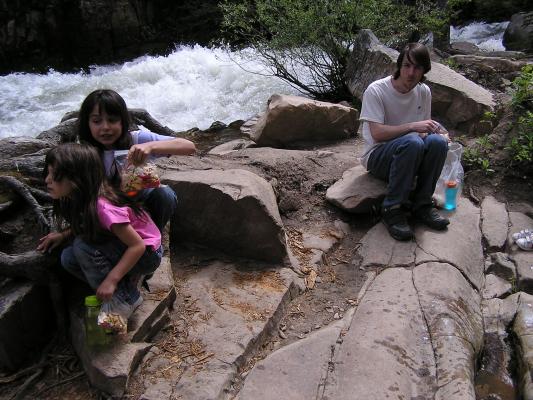 Andrea, Malia and David enjoy the falls.