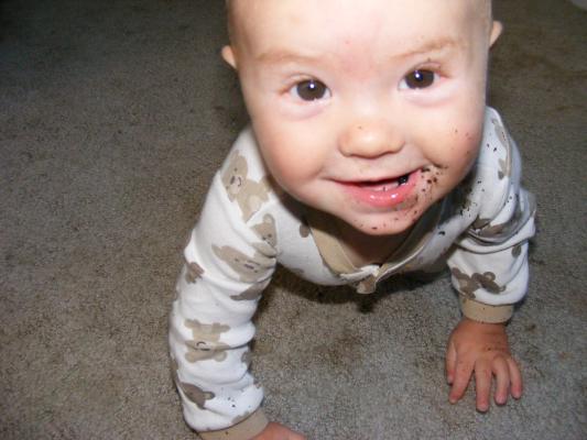 Joshua cot eating dirt.
