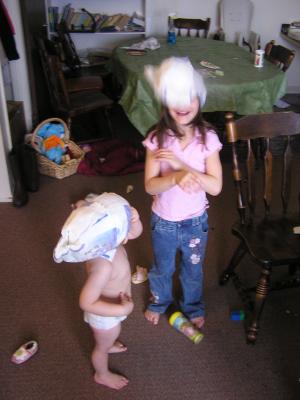 Noah and Andrea with diapers on their heads.