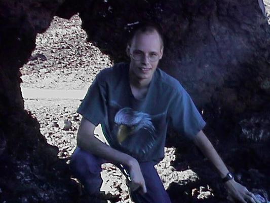Dale peeks through the rocks
