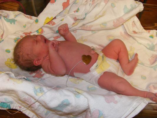 Joshua with his heart shaped temperature monitor.