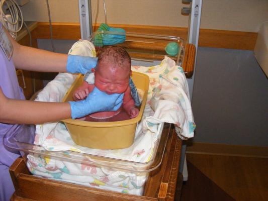 Joshua gets a bath.