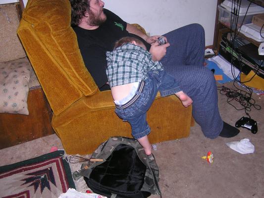 Noah fell asleep wathcing Benji play video games