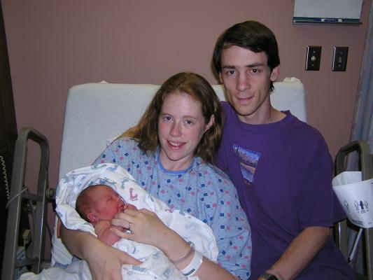 Katie and David hold Noah