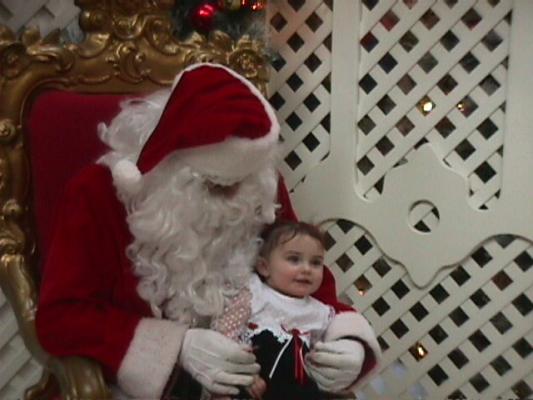 Malia with Santa Clause