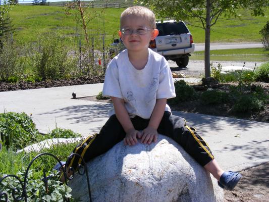 Noah on a rock.