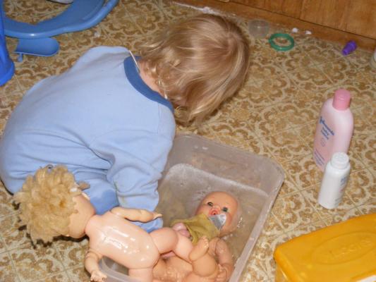 Sarah gives the babies a bath