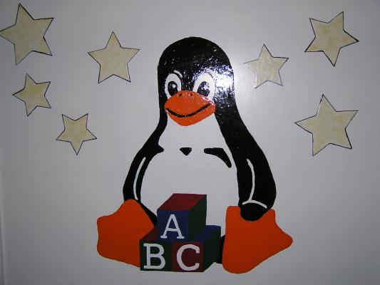 Tux on the crib