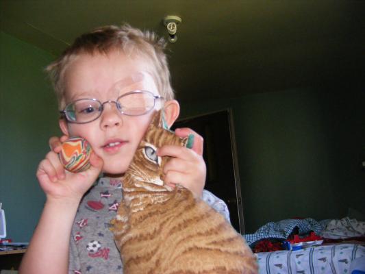 Noah with his favorite toys.