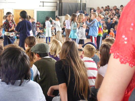 Andrea ( in blue) dancing for international day.