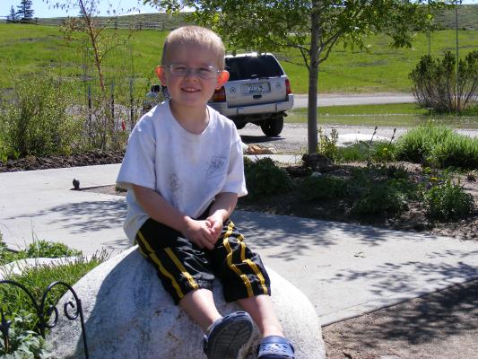 Noah on a rock.