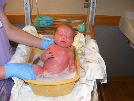 Joshua gets a bath.