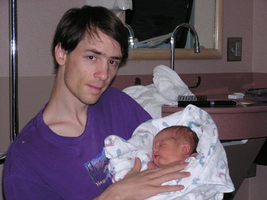 Dad holds baby