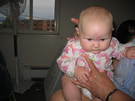 Grandma holds Sarah.