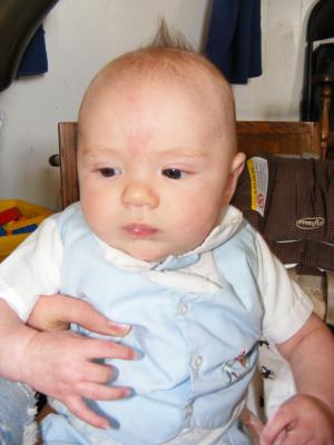Joshua all dressed up in a blue suet.